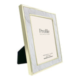 Elegant Terrazzo marble metal photo frame with gold edges, perfect for showcasing cherished memories in any orientation.