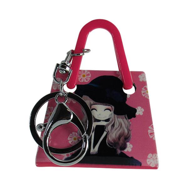 Chic 3D acrylic key ring handbag in glamorous design, perfect for organizing essentials stylishly.