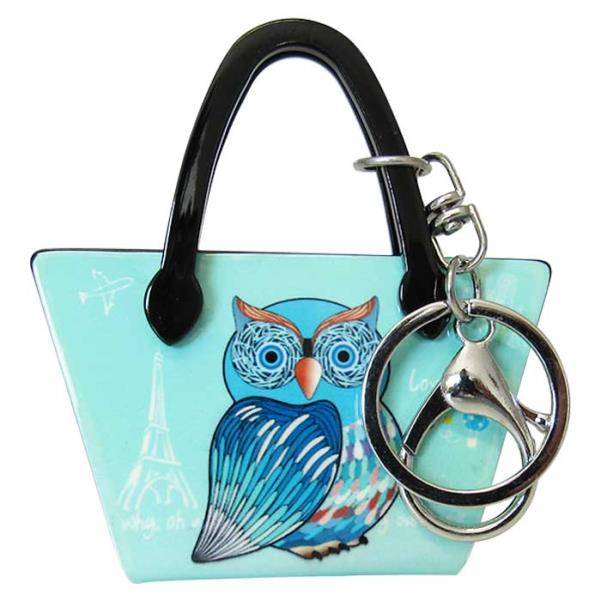 Whimsical green owl keyring, 7.5cm W x 8.0cm H, perfect for handbags and adding a stylish touch to your accessories.