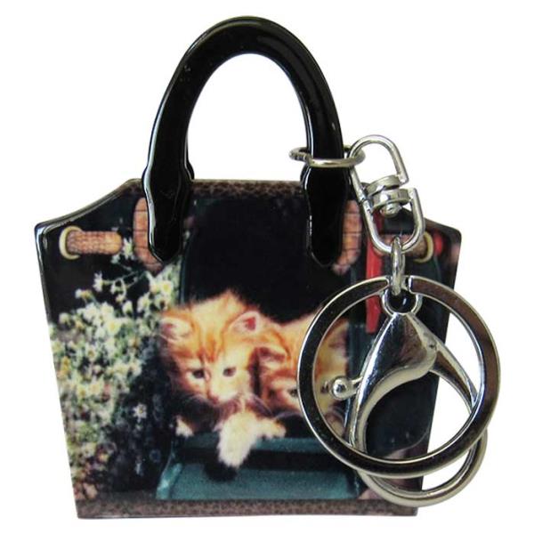 Charming Handbag Kittens keyring in high-quality acrylic, perfect for cat lovers to accessorize keys or bags.