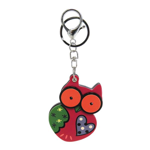 Owl-shaped keyring with a compact mirror, 7.5 x 5.5 cm, combining charm and functionality for on-the-go beauty checks.