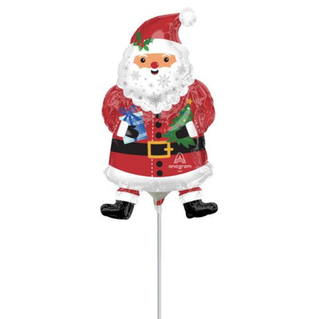 Colorful foil balloon featuring a whimsical snowy Santa design, perfect for Christmas decor and festive celebrations.