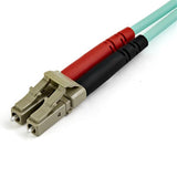 Aqua 10m OM4 LC to LC fiber optic patch cable, ideal for high-speed 40G/100G networks, with LSZH jacket for safety and durability.