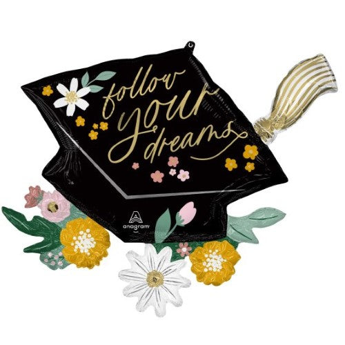 Colorful graduation cap foil balloon with "Follow Your Dreams" message, perfect for celebratory decor and photo opportunities.