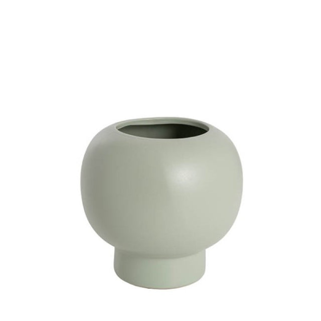 Ceramic Diara Fish Bowl in matte sage, perfect for plants or flowers, enhancing decor with its elegant design.