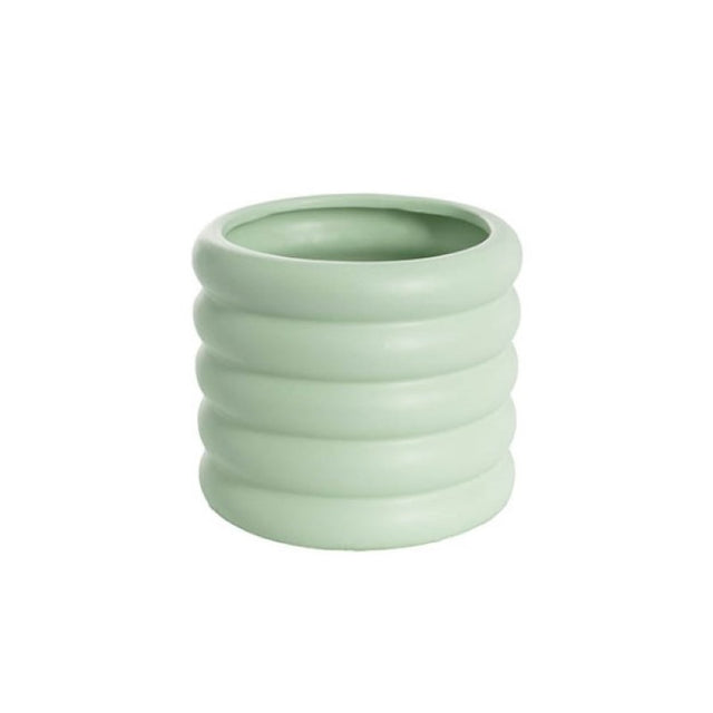 Ceramic Beehive vase in soft green, perfect for indoor plants and floral arrangements, enhancing any home decor.
