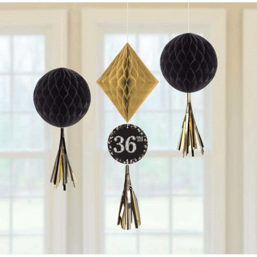 Vibrant honeycomb hanging decorations for any age, featuring tissue and foil tails, personalized with age stickers.