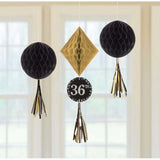 Vibrant honeycomb hanging decorations for any age, featuring tissue and foil tails, personalized with age stickers.