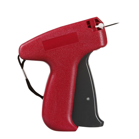 Quikstik Tagger Gun Machine for fast tag attachment to clothing and crafts, featuring safety cap and compatible needles.