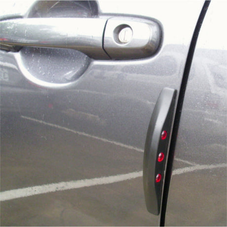 Black reflectors for car doors, preventing dents and scratches with easy peel-and-stick installation for sleek protection.