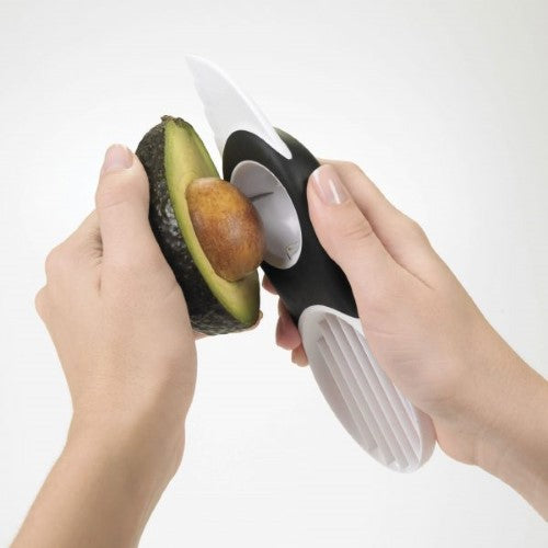 3-in-1 Avocado Slicer featuring a plastic blade, pitting tool, and fan blade for easy slicing and serving of avocados.