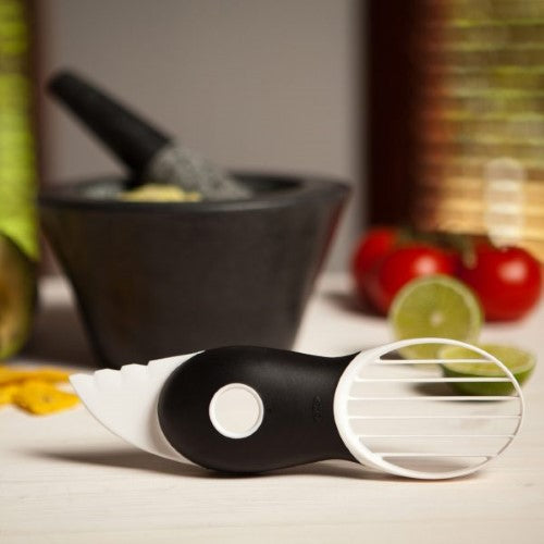 3-in-1 avocado slicer with plastic blade, pitting tool, and fan blade for easy slicing, scooping, and removing pits.