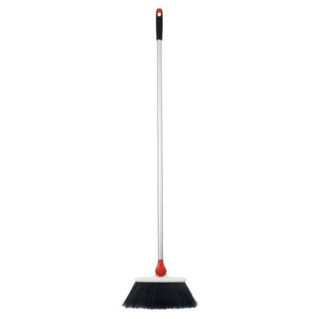 OXO Good Grips Any-Angle Broom with adjustable head and flexible bristles for easy cleaning in hard-to-reach areas.