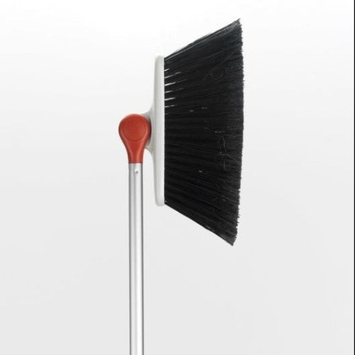 Adjustable Any-Angle Broom by OXO Good Grips features flexible bristles for efficient cleaning in hard-to-reach places.