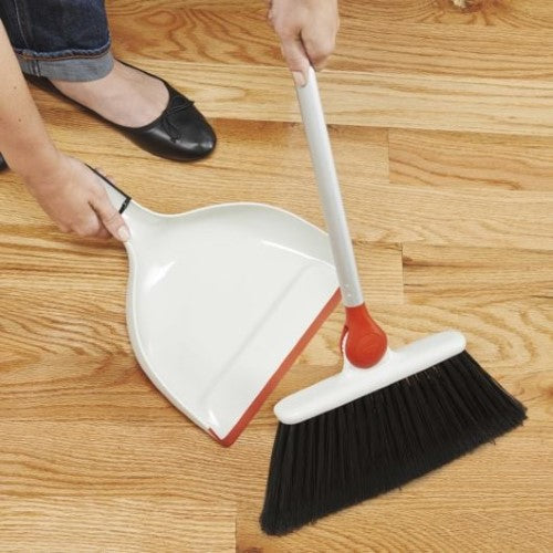 Adjustable OXO Good Grips Any-Angle Broom for efficient cleaning in hard-to-reach areas with flexible bristles and modern design.