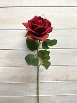 Lifelike red artificial rose spray with bud, perfect for effortless home décor and versatile arrangements.