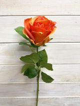 Vibrant orange artificial Alice rose bud stem, perfect for low maintenance decor and adding color to any space.