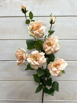 Lifelike peach Camilia artificial flower spray with 5 blooms and 2 buds, perfect for elegant home or office decor.