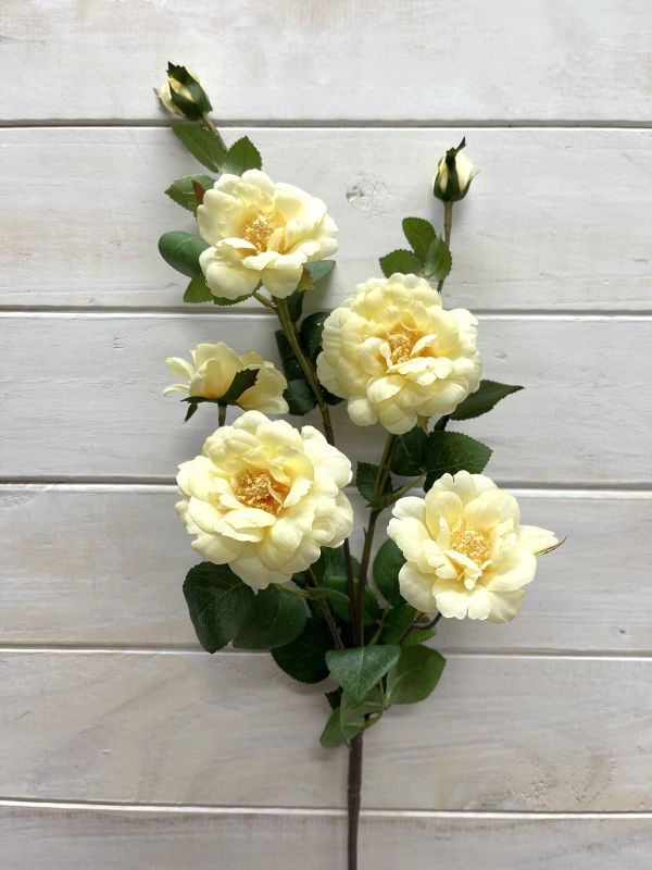 Soft yellow Camilia artificial flower spray featuring 5 flowers and 2 buds, ideal for elegant, low-maintenance home decor.