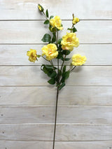 Vibrant yellow artificial Camilia flower spray with five lifelike blooms and two buds, perfect for low-maintenance decor.