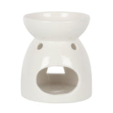 Elegant white ceramic oil burner featuring an angel cutout, perfect for enhancing ambiance with fragrance oils and wax melts.