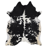Stylish black and white Meadow Cowhide rug, 160x210cm, crafted from 100% natural cowhide for a unique decor accent.