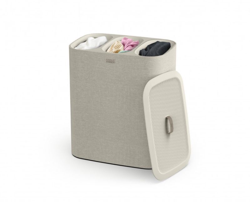 Ecru laundry basket with three removable tote bags for easy separation of light, dark, and colored fabrics.