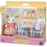 Sylvanian Families breakfast set featuring Snow Rabbit mother and baby with table, chairs, and food accessories for imaginative play.