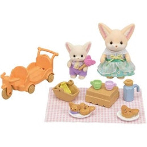 Sylvanian Families Sunny Picnic Set with Fennec Fox sister Jasmine and baby brother Caleb on a tricycle with picnic supplies.