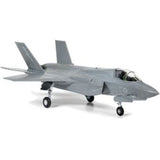 Airfix 1/72 Lockheed Martin F-35B model kit with paints, glue, brushes, and stand for easy assembly and display.