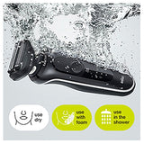 Braun Wet & Dry shaver with charging stand, two attachments, and three flexible blades for convenient grooming.