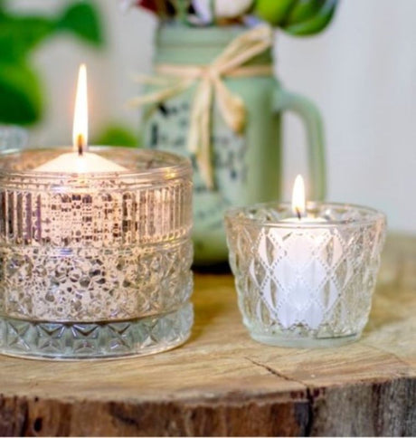 Elegant clear glass candle holder with diamond pattern, 7.5x6cmH, perfect for tea lights and enhancing decor.