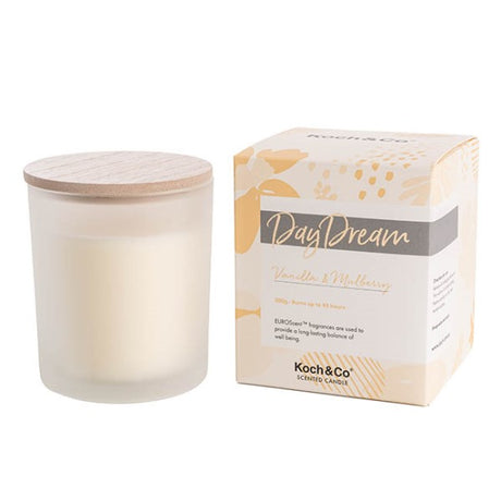Scented candle in a stylish container, featuring creamy vanilla and sweet mulberry, perfect for creating a serene ambiance.