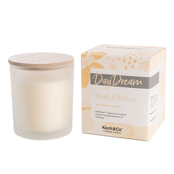 Scented candle in a stylish container, featuring creamy vanilla and sweet mulberry, perfect for creating a serene ambiance.