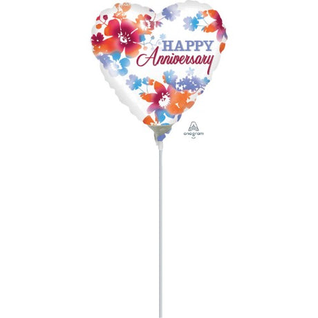 Colorful "Happy Anniversary" foil balloon with a watercolor design, perfect for enhancing anniversary celebrations.