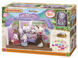 Sylvanian Families Boutique set featuring Persian Cat Mother, stylish accessories, clothing, and display items for imaginative play.