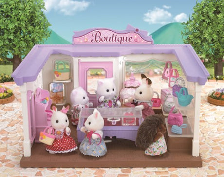 Sylvanian Families Boutique features a stylish Persian Cat Mother, chic accessories, and a glamorous setup for fashion play.