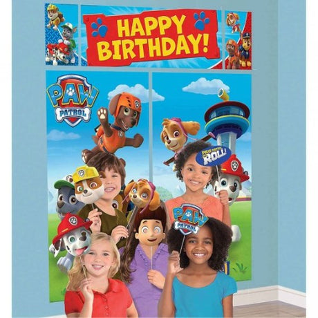 Paw Patrol Happy Birthday Scene Setter set featuring vibrant decorations and props for a fun kids' birthday celebration.