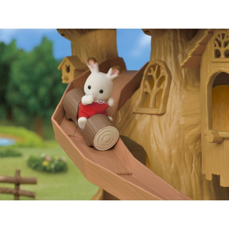 Playful Sylvanian Families Adventure Tree House with rope swing, slide, and four rooms for imaginative role-play fun.