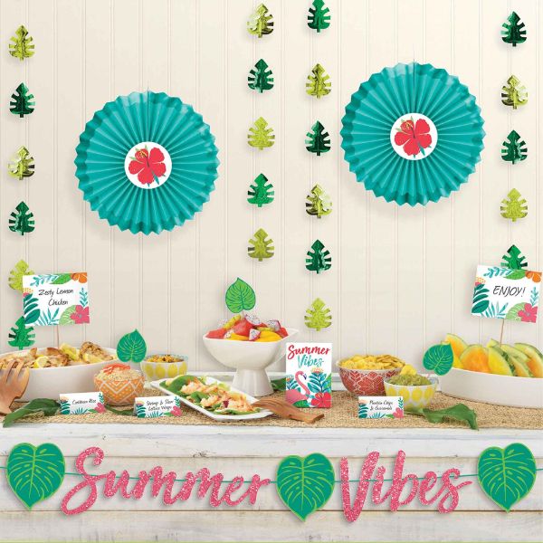 Vibrant Tropical Jungle Buffet Decorating Kit with tent cards, picks, hanging decorations, and a glitter banner for summer parties.