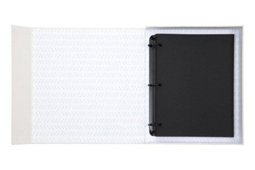 Elegant large photo album with natural cloth cover, designed to display cherished memories and mementos safely.