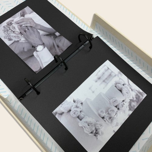 Pack of 10 black drymount photo album sheets, 210x280mm, acid-free and pre-punched for easy photo display and preservation.