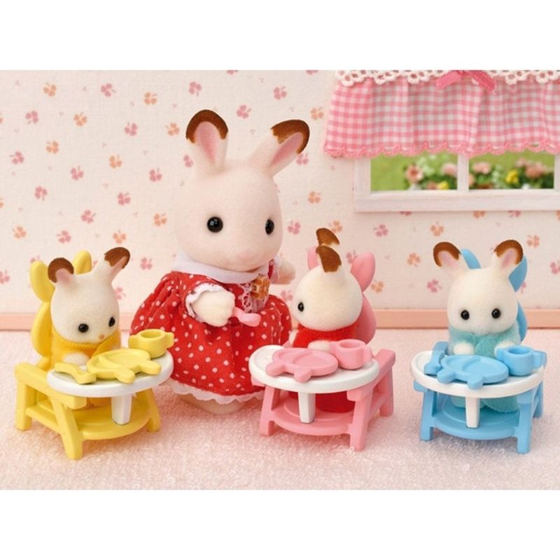 Adorable Chocolate Rabbit triplets in colorful outfits with baby furniture and toys for nurturing imaginative play.