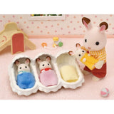 Sylvanian Families Triplets Care Set featuring Chocolate Rabbit triplets with furniture and accessories for nurturing play.