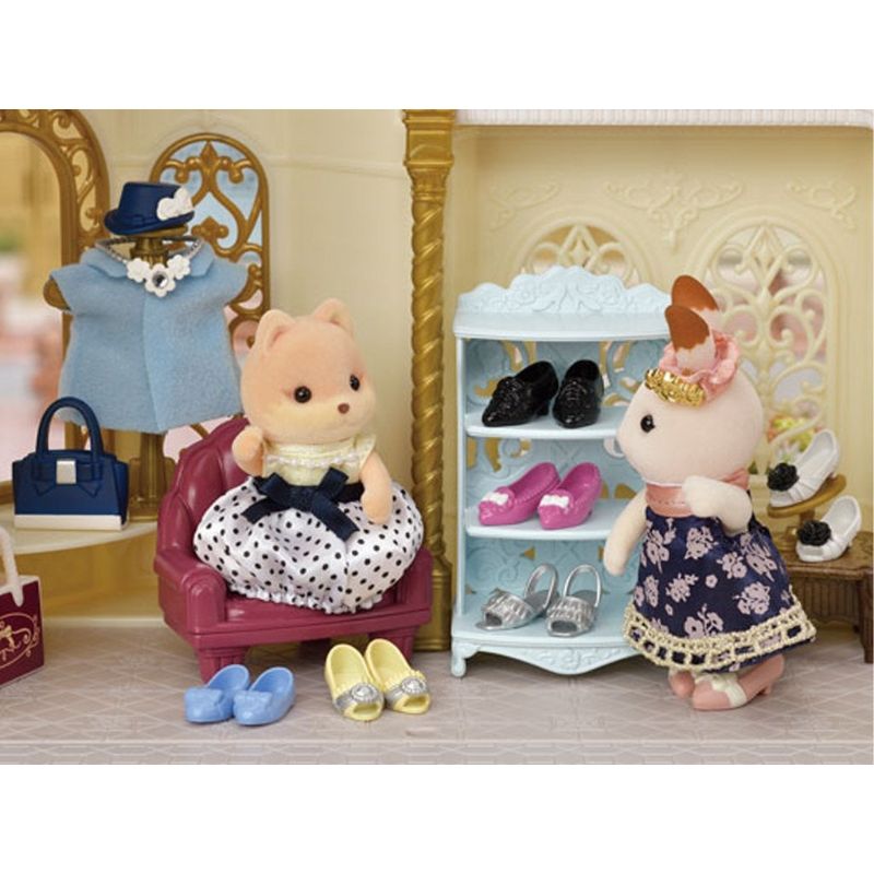 Sylvanian Families Shoe Shop Playset featuring Melanie Caramel with stylish shoes and accessories for imaginative fashion play.