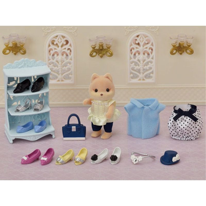 Sylvanian Families Shoe Shop playset featuring Melanie Caramel, stylish shoes, and outfit accessories for imaginative play.