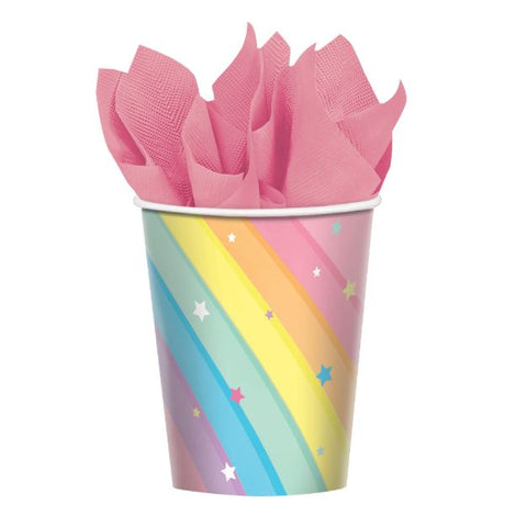Vibrant 9oz paper cups featuring a magical rainbow design, perfect for kids' birthday celebrations and festive occasions.