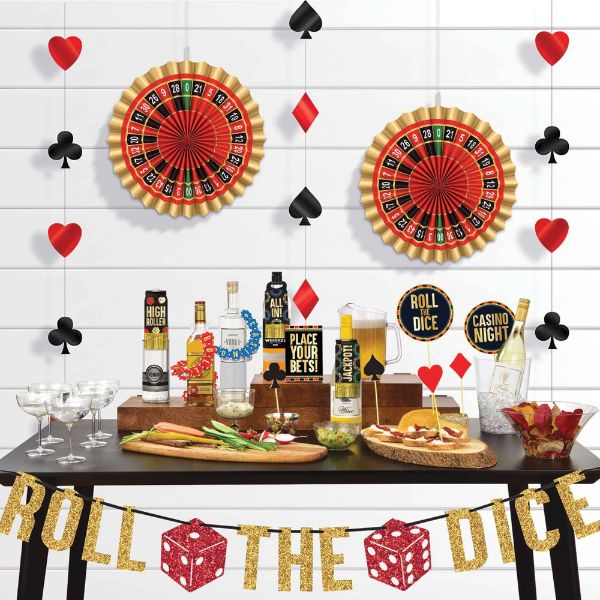 Casino bar decorating kit with vibrant tent cards, picks, bottle tags, and hanging decorations for a festive party atmosphere.