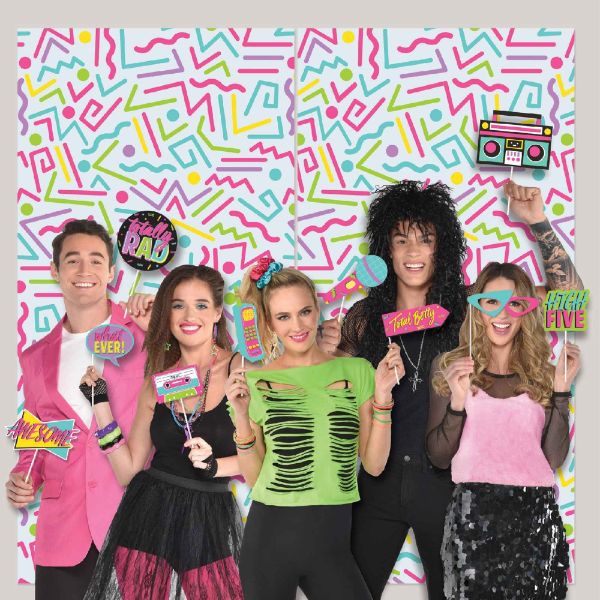 Colorful 80's scene setter with retro photo props for nostalgic parties and fun photo booths, perfect for any celebration.