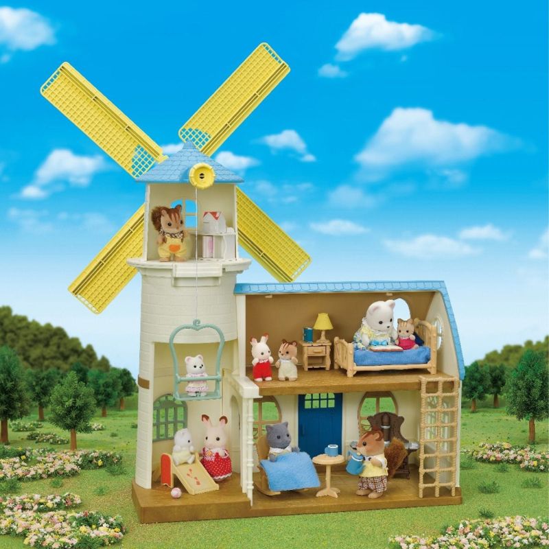 Alt text: "Sylvanian Families Celebration Windmill set featuring a light blue windmill, Polar Bear figures, and 36 accessories for imaginative play."